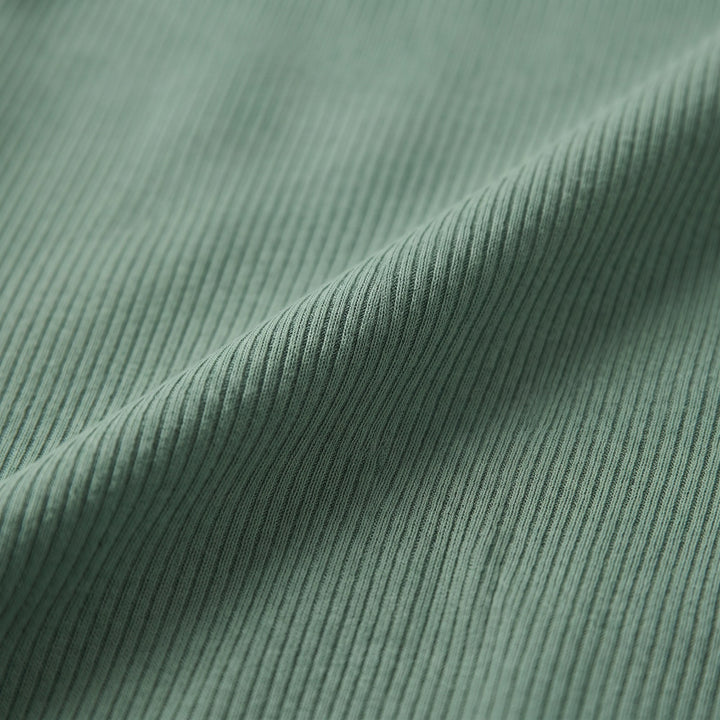 Roselyne flare pants ribbed stretch knit fabric close-up