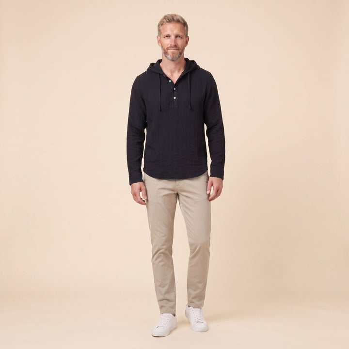 Seven linen hooded henley shirt in black, front view on model