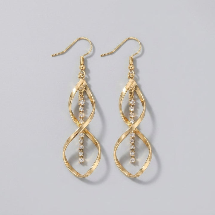Solania gold spiral hanging earrings