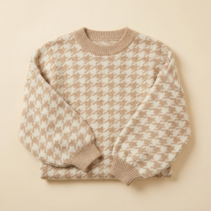 Sylvine houndstooth sweater in beige, flat lay showing crew neck and ribbed cuffs