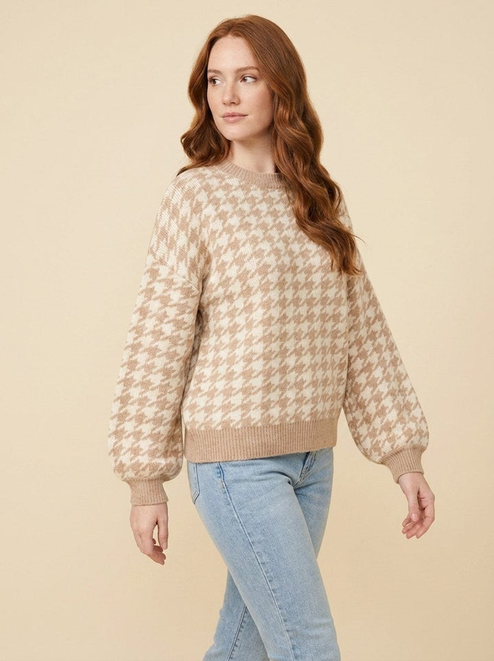 Sylvine houndstooth sweater in beige, styled pose on model