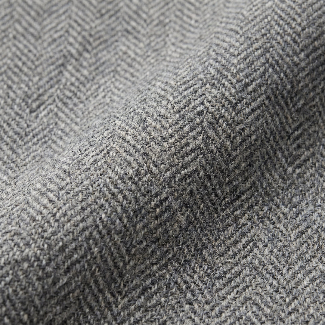 Tavi wool trousers herringbone fabric close-up