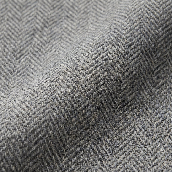Tavi wool trousers herringbone fabric close-up