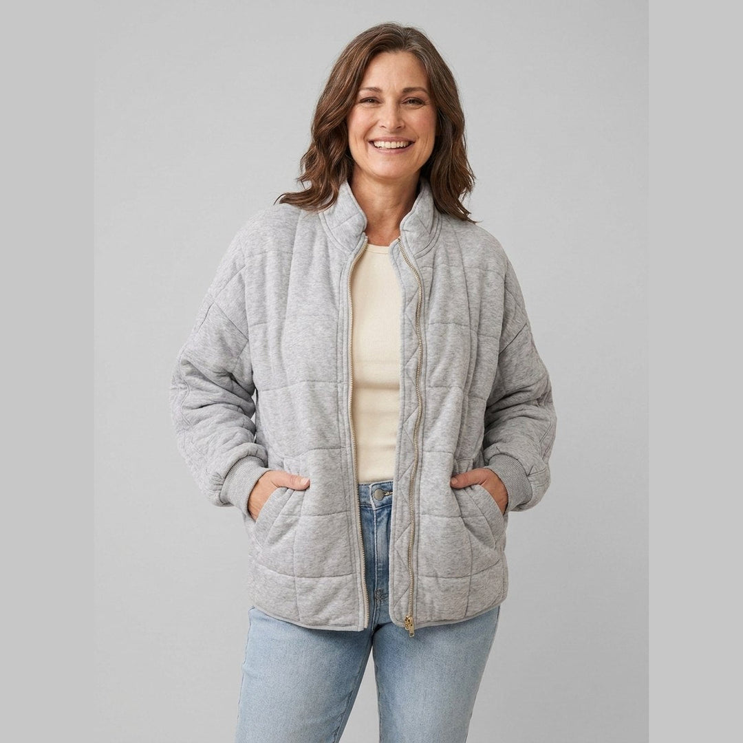 Timber oversized quilted jacket in grey on model