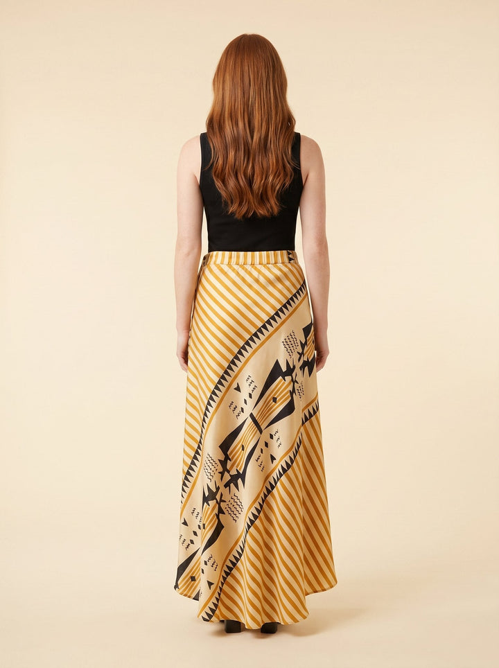 Satin maxi skirt seen from behind, showing the elastic waist