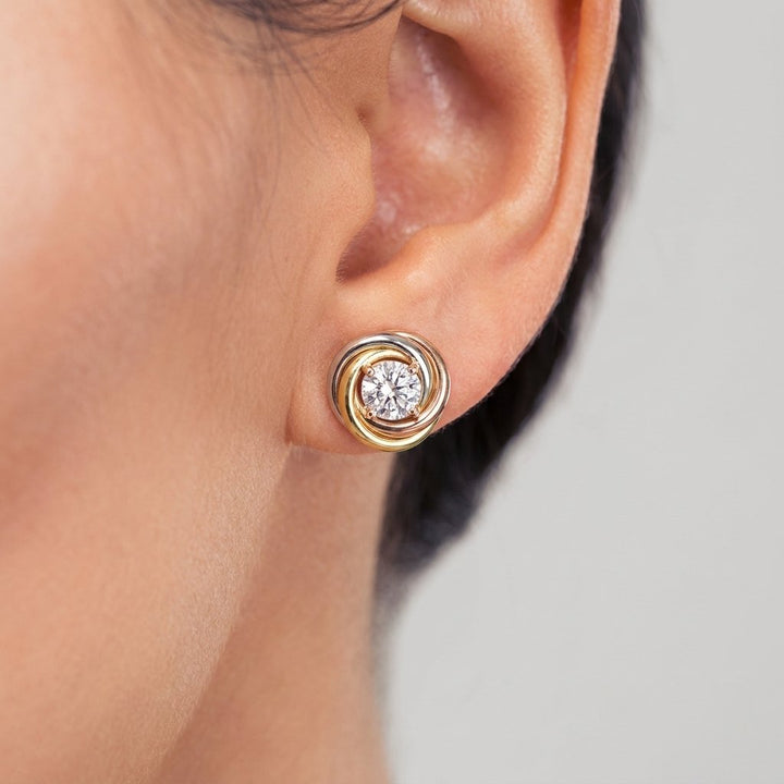 Trinity earring worn on ear