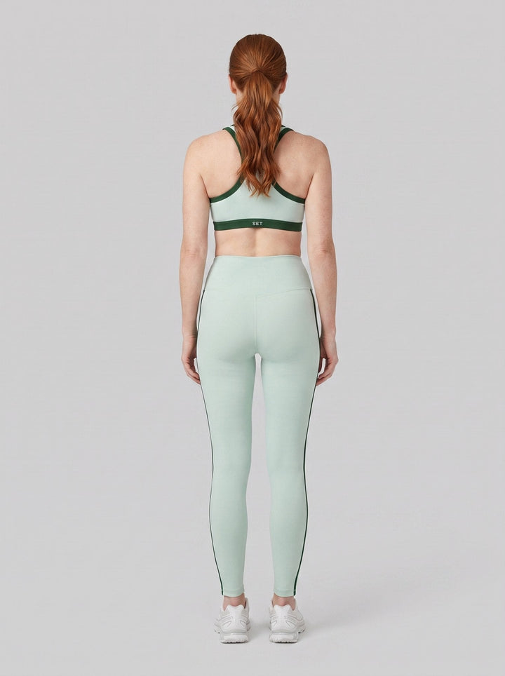Striped high-rise leggings in Ibiza, back view on model