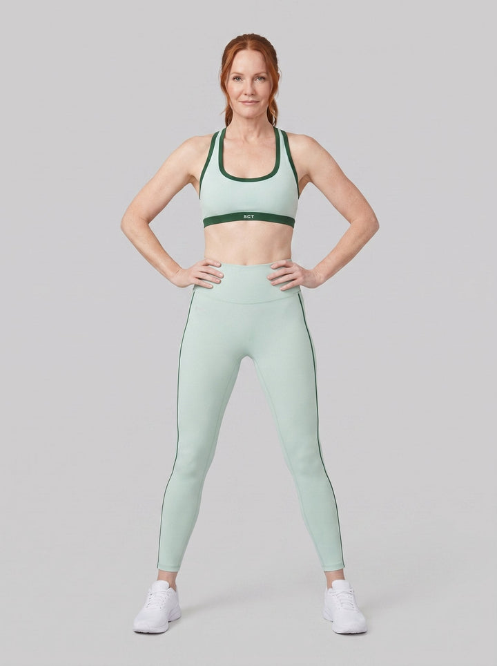 High-rise striped leggings in the Ibiza colourway, front view on model