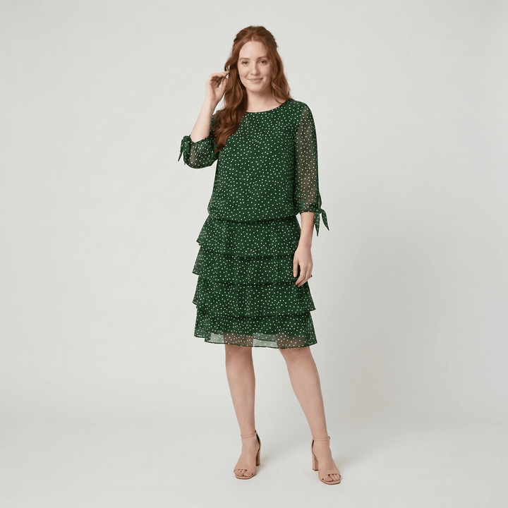 Victoire green polka dot dress with a layered skirt, front view