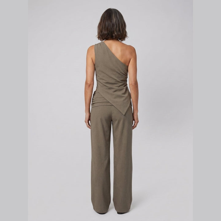 Wren khaki one-shoulder top, back view on model
