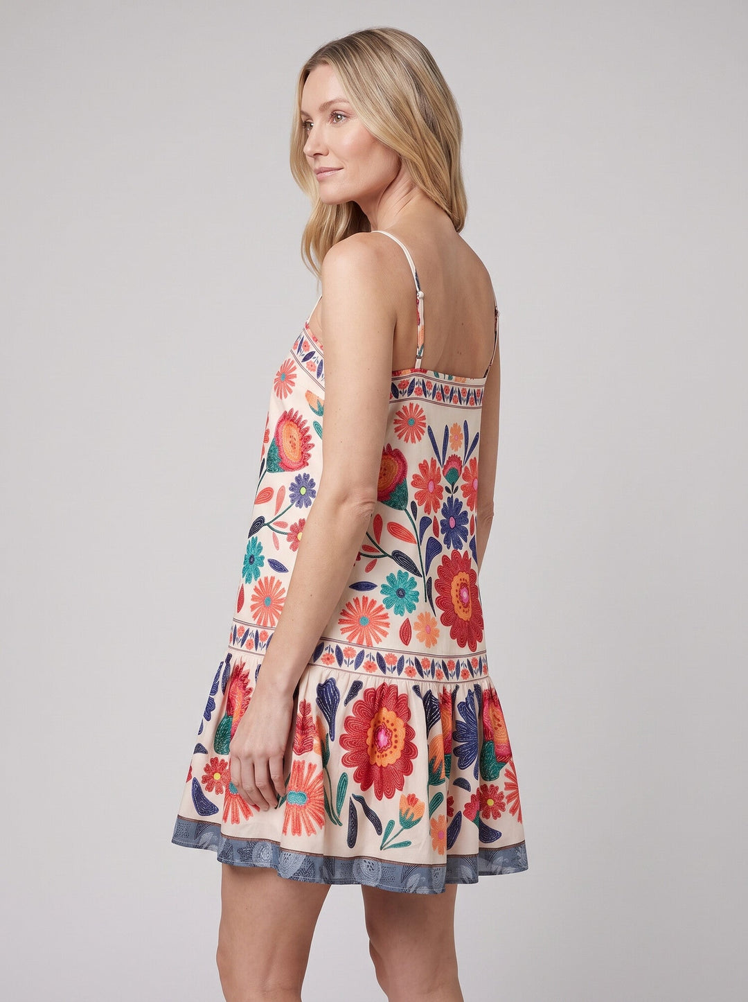 Zaria Bloom Dress orange folk-floral side on model