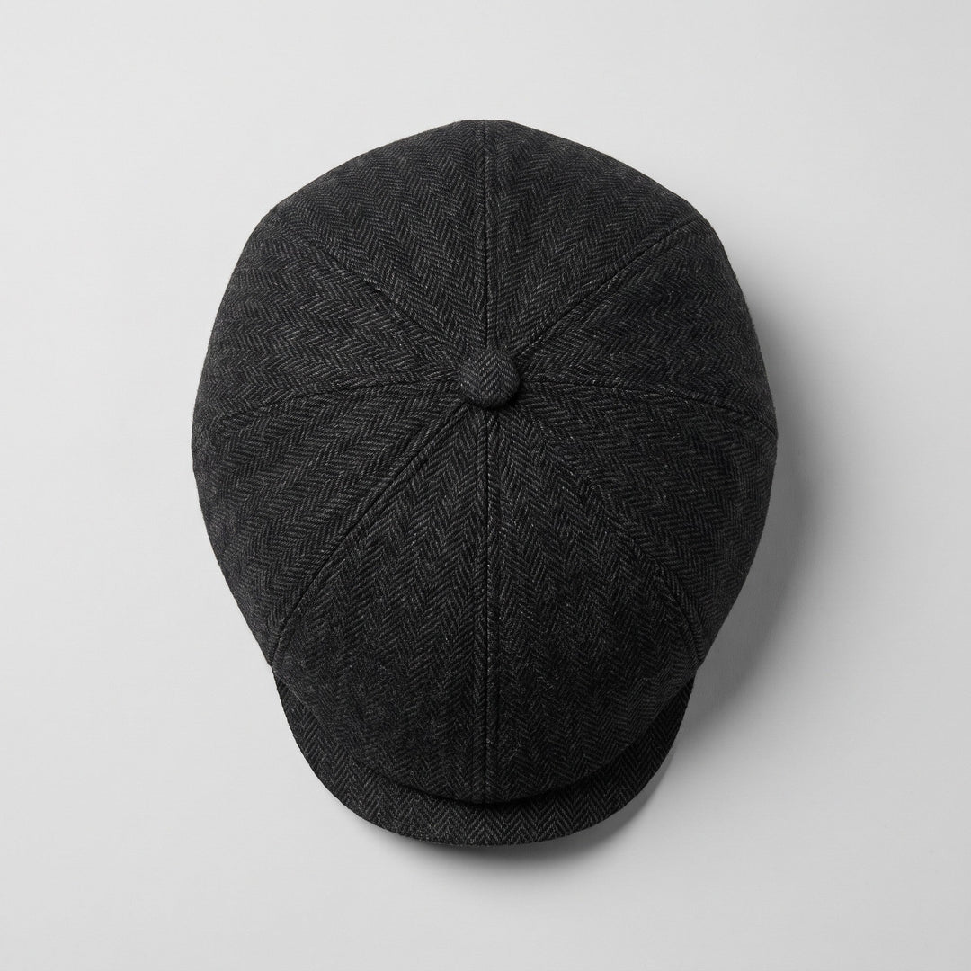 Flat cap seen from above, panelled crown