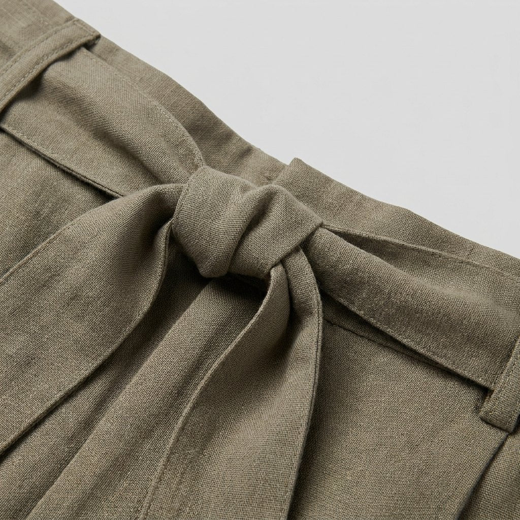 Wendy Wildfire olive trousers fabric and sash detail close-up