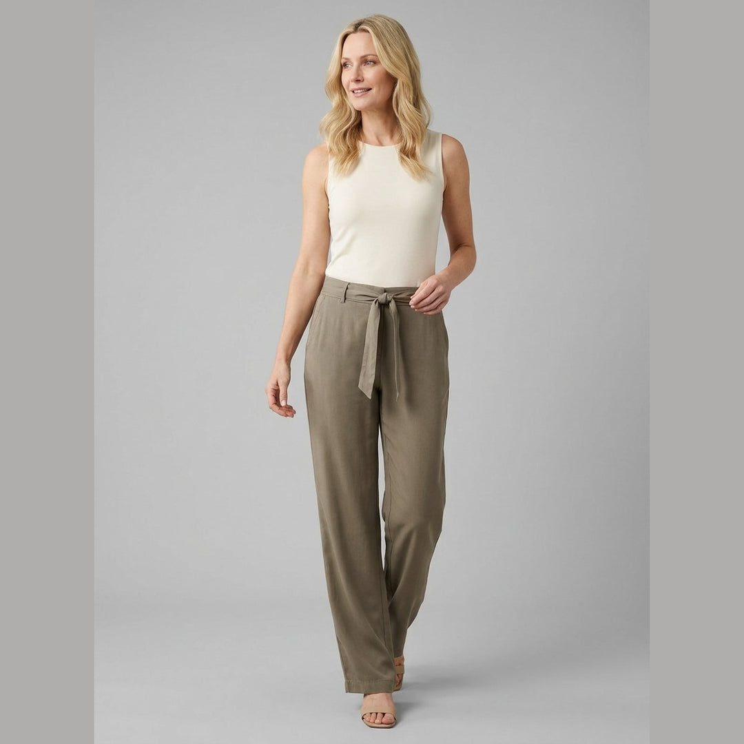 Wendy Wildfire olive trousers three-quarter walking pose