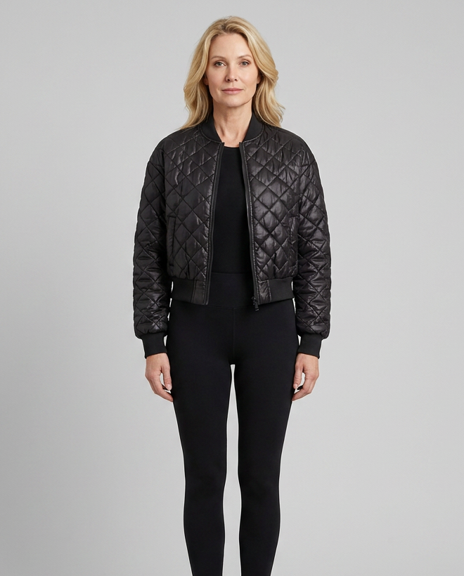 Women's black quilted bomber jacket, close-up