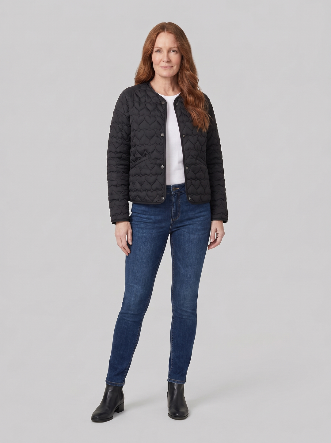 Women's black quilted jacket, front