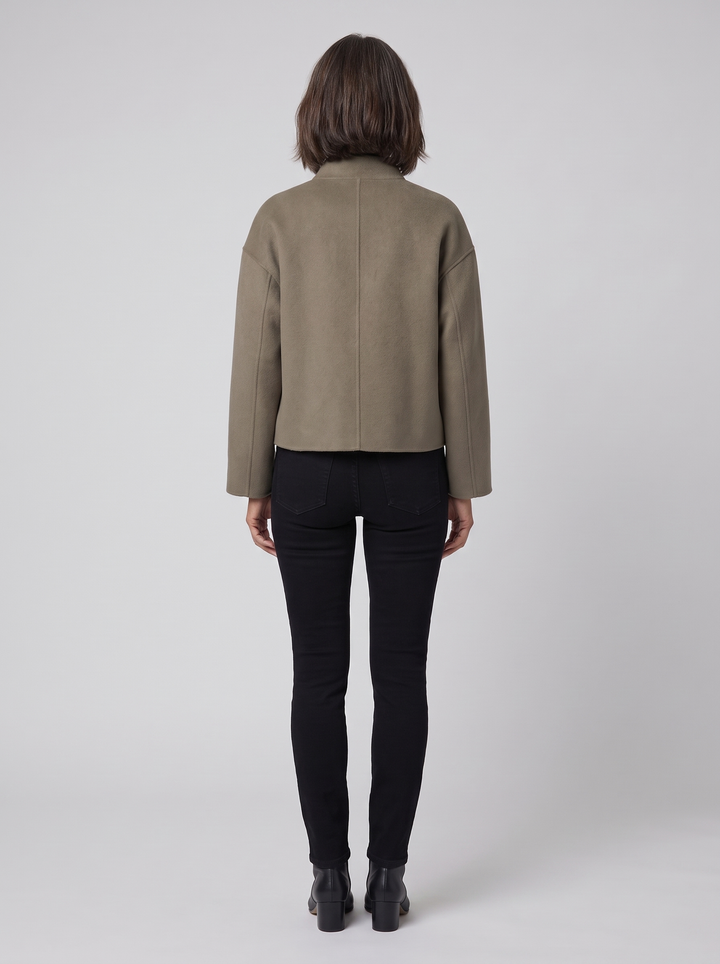Women's olive short jacket, back view