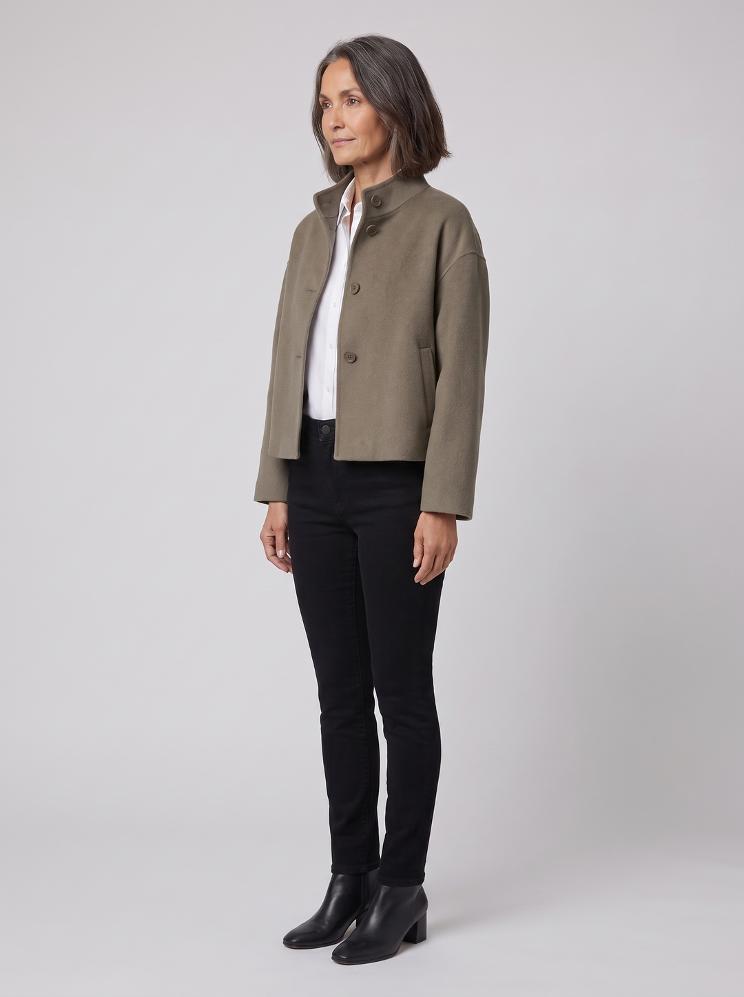 Women's olive short jacket, side view